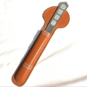 SILVER STAINLESS LETTER OPENER IN A LEATHER SHEATH